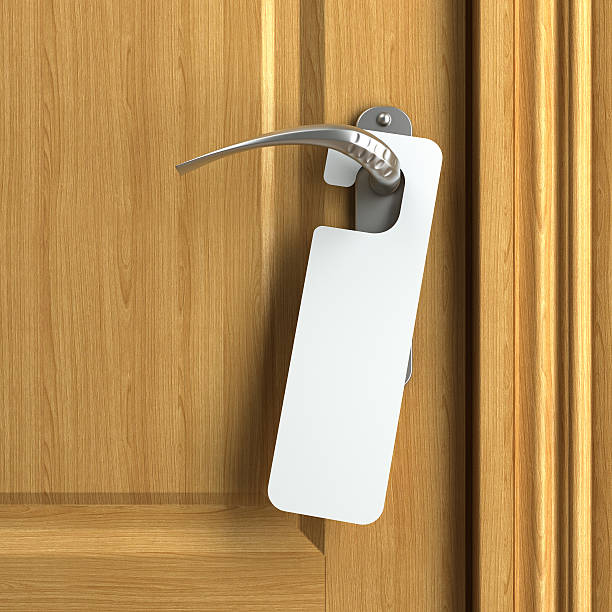 istock white card with copy space on doorknob 179281339