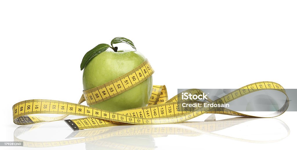 Saudável Maçã verde e uma fita de medição isoladas - Royalty-free Alimentação Não-saudável Foto de stock