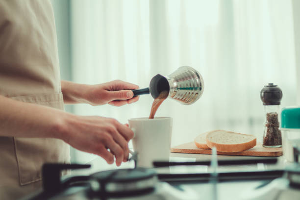 istock Brewing hot tasty aromatic coffee from cezve 1792817830