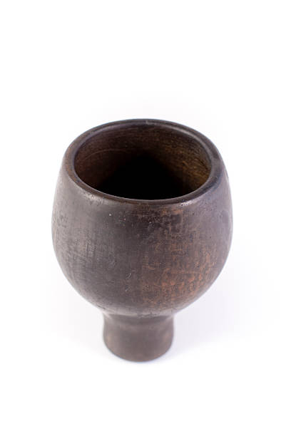 istock Clay pot of black color on a white background 179281859
