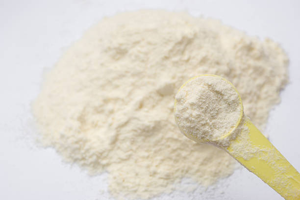 istock powder milk and yellow spoon 179282812