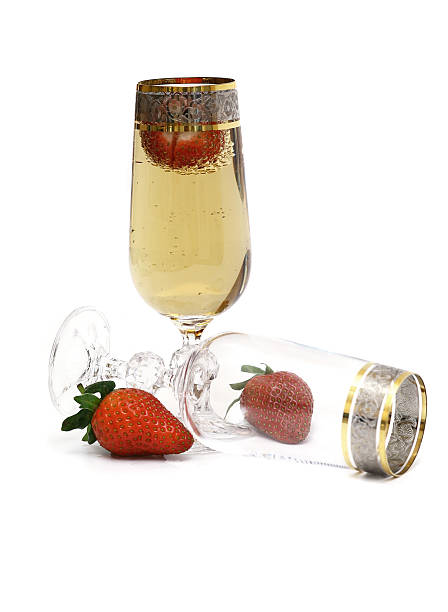 istock Glasses with champagne and a strawberry. 179283071