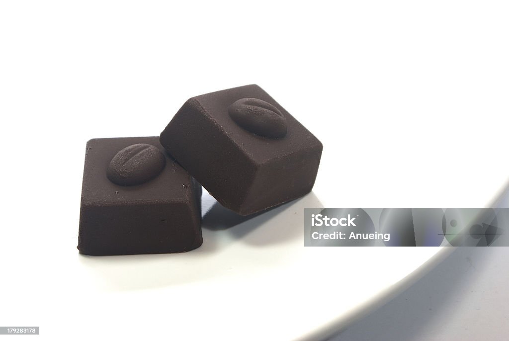 chocolates detalhe em fundo branco - Foto de stock de Alimentação Não-saudável royalty-free