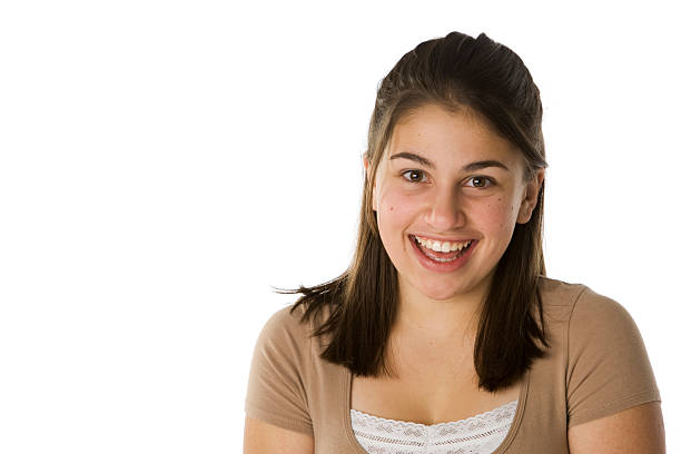 Facial expression: Close-up of a Hispanic young girl winking eye.