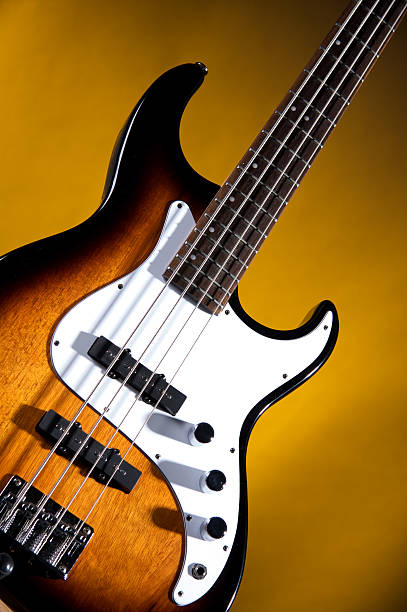 istock Electric Bass Guitar On Gold 179286211