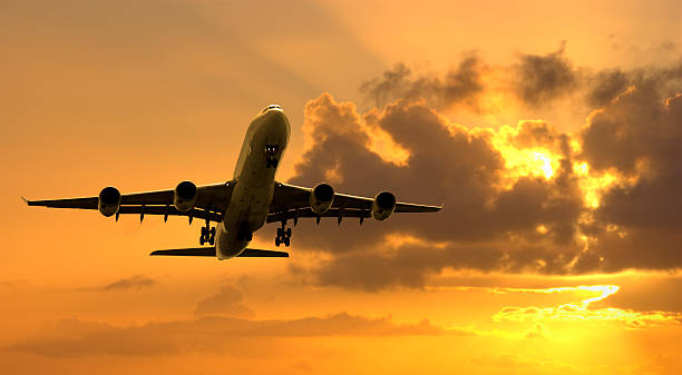 istock Jet Aeroplane Landing at Sunset 179286231