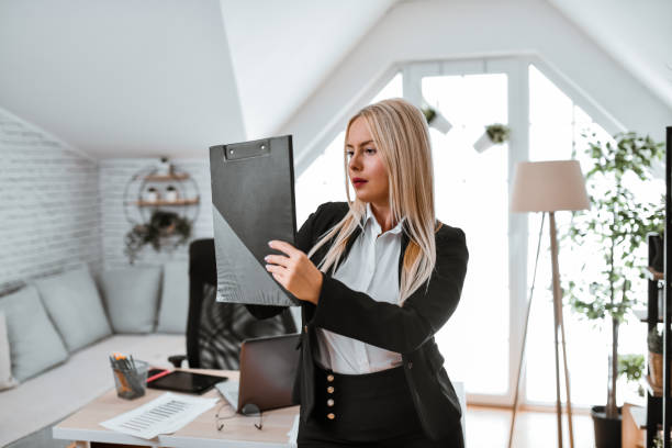 istock Female Human Resources Manager Checking Job Applications On Clipboard 1792863990