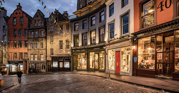 Edinburgh, Scotland - 7 May, 2023: Famous Victoria street at night in Edinburgh old town