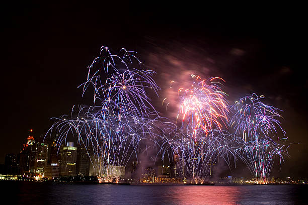 4th of July in Detroit with fireworks exploding stock photo