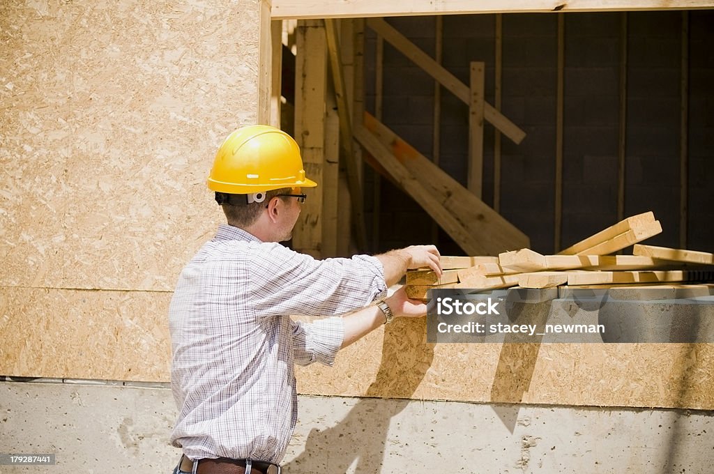 Ingeniero y Trabajador de construcción en sitio serie - Foto de stock de Accesorio de cabeza libre de derechos