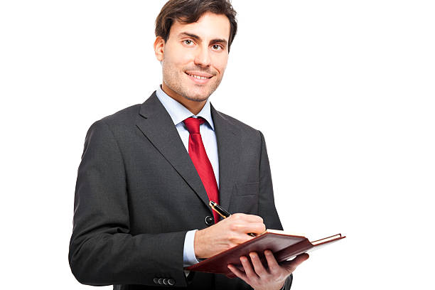 istock Businessman holding his agenda 179287831