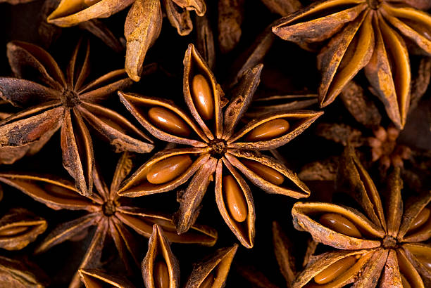 Close-up montage of star anise Star anise background. star anise stock pictures, royalty-free photos & images
