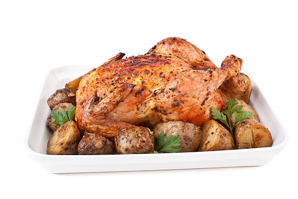 istock golden roasted chicken with potatoes 179288746
