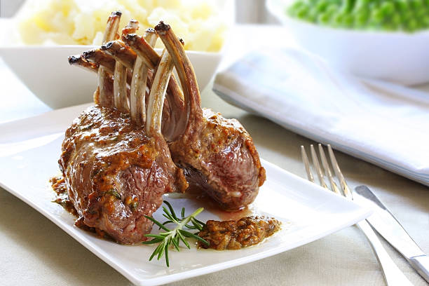 Rack of Lamb "Rack of lamb, with mustard and garlic sauce.Please see my lamb meals lightbox:" rack of lamb stock pictures, royalty-free photos & images
