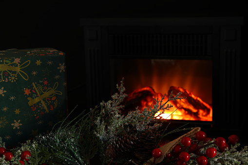 Present at Christmas with warm fire