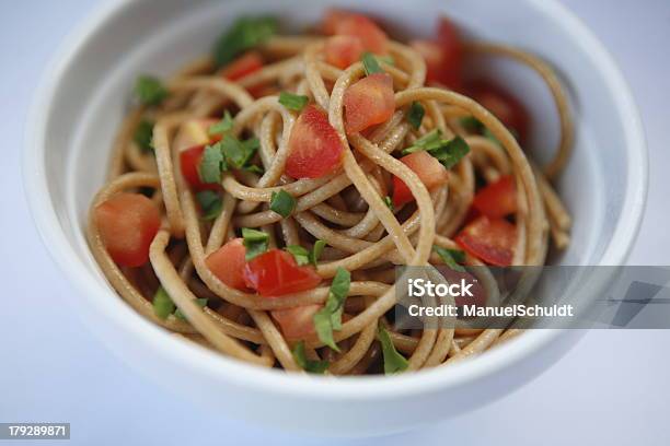 Wholemeal Spaghetti Stock Photo - Download Image Now - Pasta, Whole Wheat, Basil
