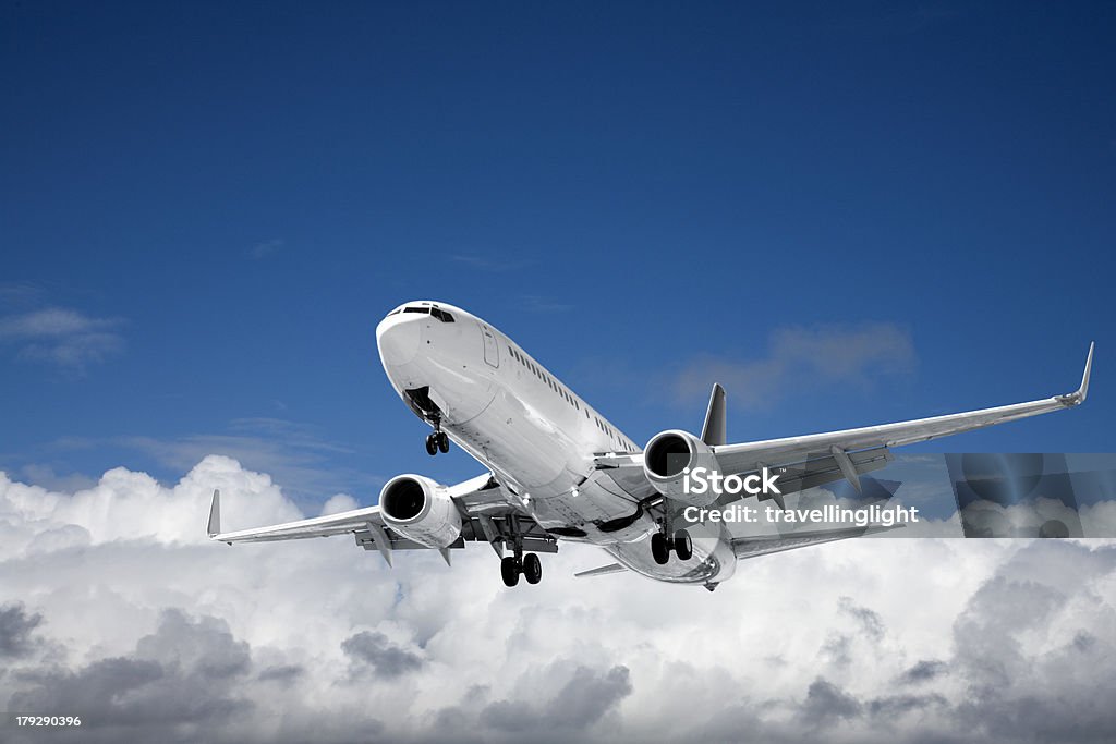 Jet Aeroplane Landing from Bright Sky Copy Space Boeing 737jet aeroplane landing from bright sky and copy space. More aircraft Air Vehicle Stock Photo