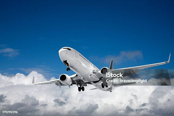 Jet Aeroplane Landing From Bright Sky Copy Space Stock Photo - Download Image Now - Air Vehicle, Airplane, Blue