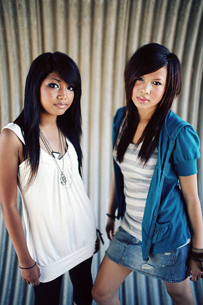 istock Dual Asian Girls in Drainage Pipe 179290692