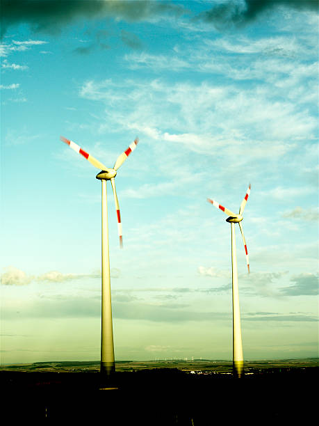 windmills in green stock photo