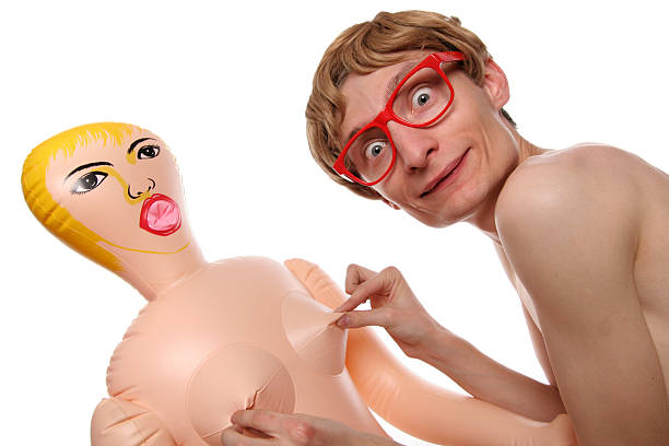 Big boys toys more adventures of a nerd: blow up doll stock pictures, royalty-free photos & images
