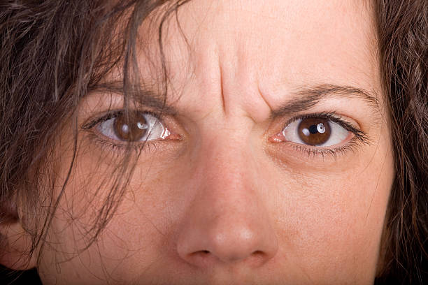 istock serious woman face 179292787