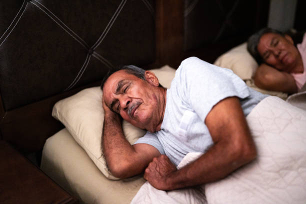 istock Senior man sleeping in the bedroom at home 1792929996