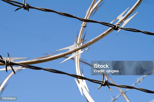 Barbed Wire Razor And Rows Traditional Isolated Blue Sky Stock Photo - Download Image Now