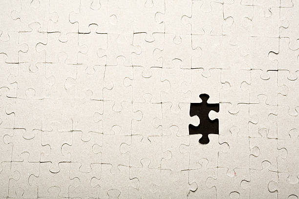 Missing puzzle piece stock photo