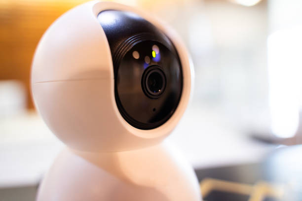 istock Smart wireless security camera at home on bokeh light background Used for security monitoring or personal CCTV 1792940032