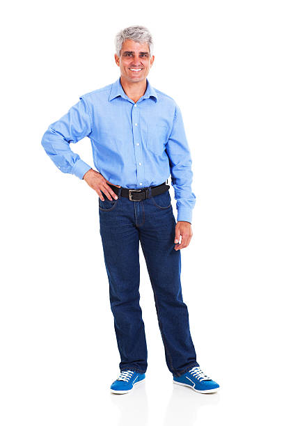 istock happy middle aged man with hand on hip 179294030