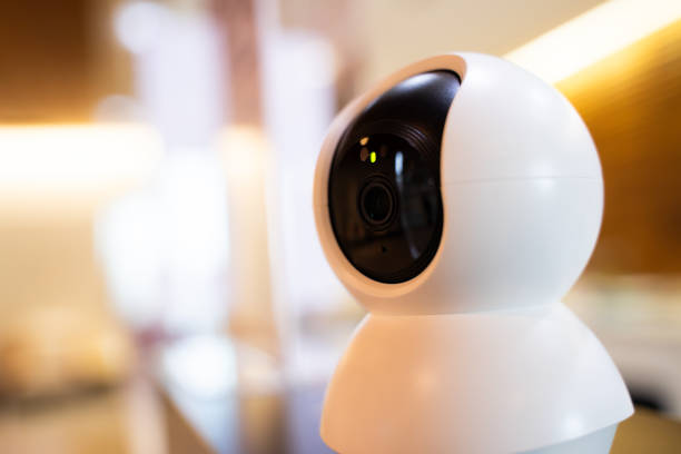istock Smart wireless security camera at home on bokeh light background Used for security monitoring or personal CCTV 1792940551