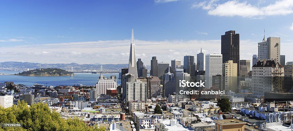 San Francisco Panorama 3 "A photo of San Francisco skyline, looking eastward. This is a seamlessly stitched panoramic shot with a lot of sharp detail. Most of the famous SF landmarks are in this shot: Bay Bridge, Transamerica building, BofA Building, Coit Tower etc. Yerba Buena island and East Bay / Oakland is in the background." Urban Skyline Stock Photo