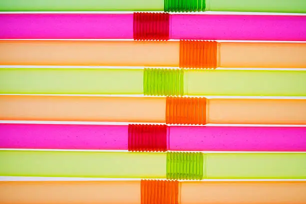A sequence of colored drinking-straws