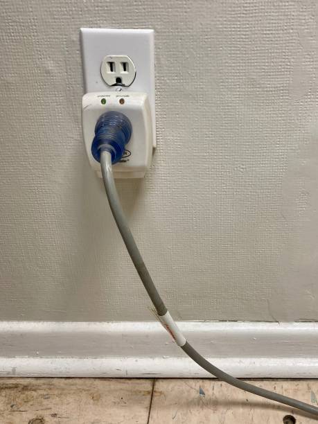 istock Ugly electric outlet with a dirty plug 1792948053