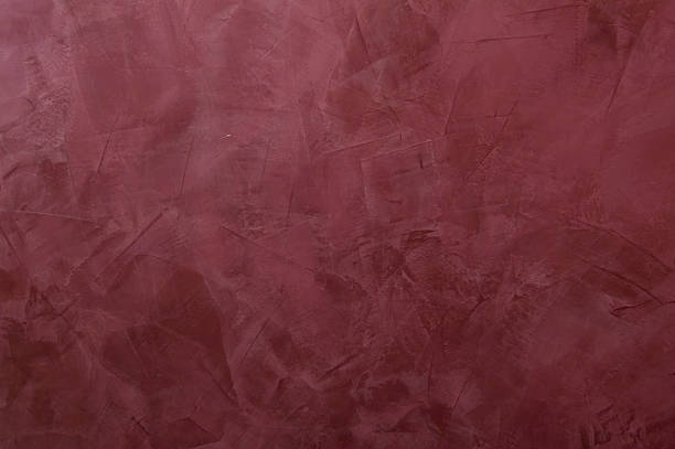 Warm rich antique plaster textured background