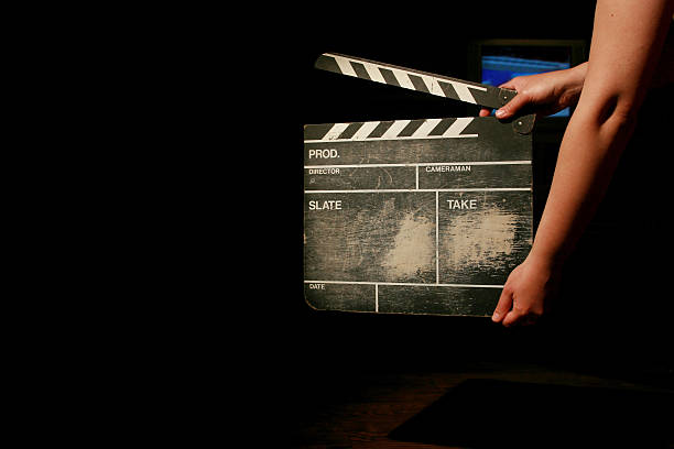 istock Person holding movie clapper board 179295347