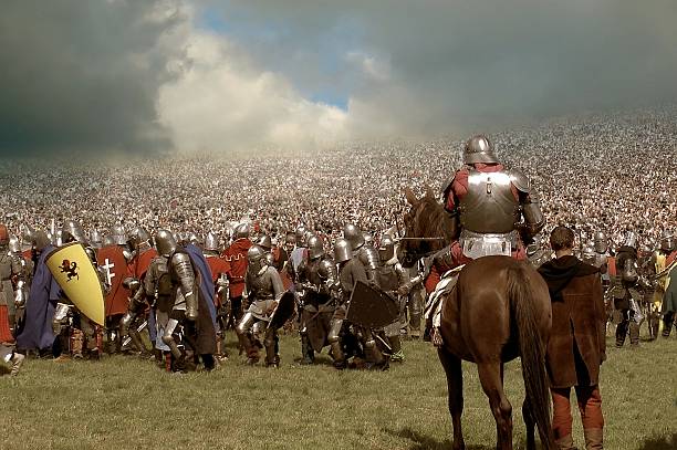 Knight riding on a horse with a sword in his hand.
