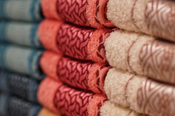 istock Folded and stacked Towels Arranged neatly on rack for sale 1792958184