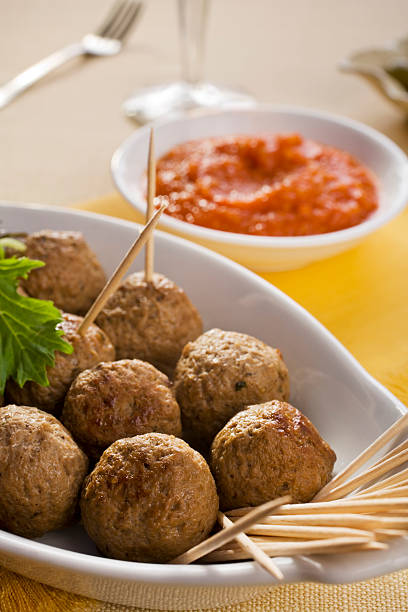 istock Spanish Tapas Albondingas on the foreground and some sauce 179296031