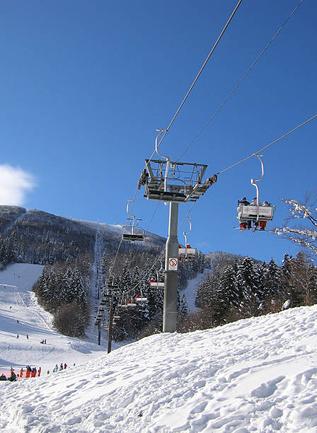 Ski lift on Bjelsnica Ski Lift running up Mount Hood to deliver skiers. north cascades national park cascade range waterfall snowcapped stock pictures, royalty-free photos & images