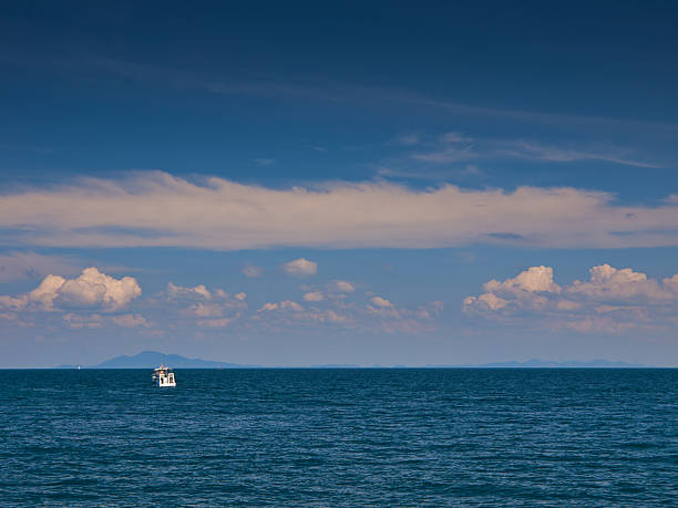 istock Small white boat on a sea 179296300