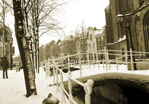 Delft - old church & snow - a photo taken with a Rolleiflex - negative scan delft winter netherlands snow stock pictures, royalty-free photos & images