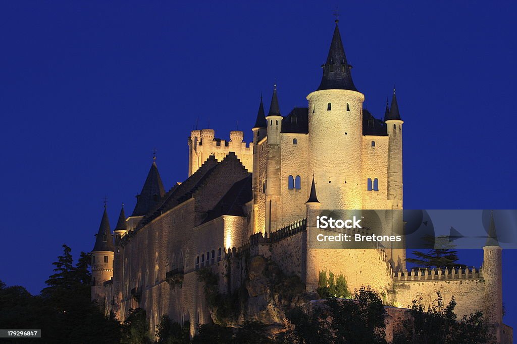 Alcazar of Segovia (Spain) night view "This magnificent castle, residence of many Spanish Royal families, is also one of the most visited in Spain. Located in Segovia, Castilla y Leon, Spain." Alcazar Castle Stock Photo