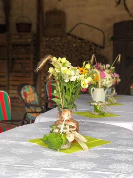 istock Natural Flowers on a table in an authentic old barn 1792968598