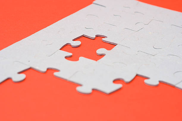 rompecabezas - portion blue jigsaw puzzle puzzle fotografías e imágenes de stock