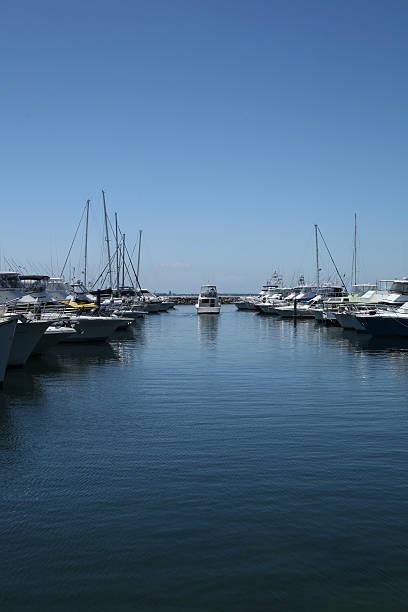 istock Boat heading out the harbour to sea 179297838
