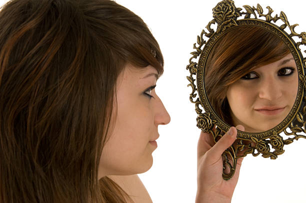 istock Girl Looking in Mirror 179297939