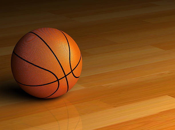 istock A basketball on a hardwood floor 179298379