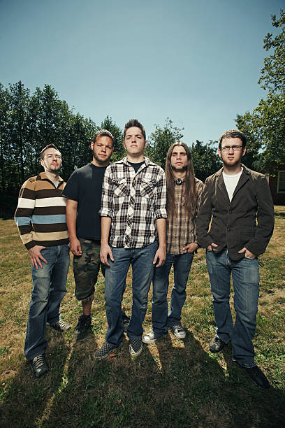 istock Five Men Standing in Grass under the Sun 179298867
